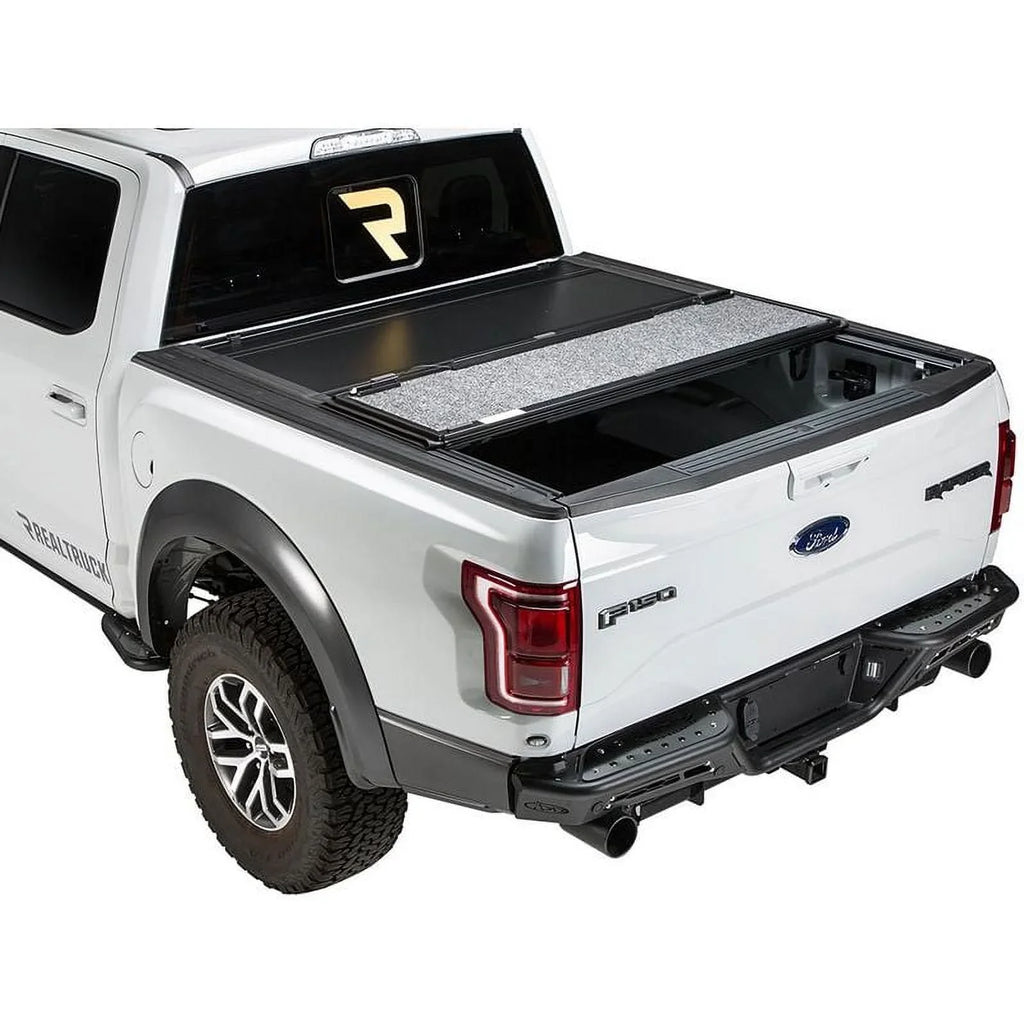 UnderCover Ultra Flex Hard Folding Truck Bed Tonneau Cover | UX42014 | Fits 2016 - 2023 Toyota Tacoma (fits w/ or w/o bedside storage boxes) 5' 1" Bed (60.5")